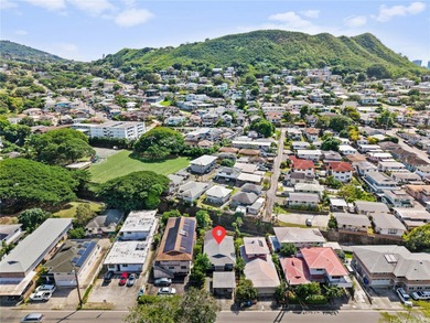A hidden gem in the heart of Honolulu, this SINGLE LEVEL