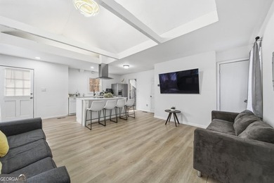 Experience lakefront living with this beautifully renovated home - photo 9