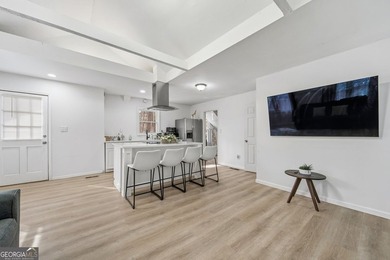 Experience lakefront living with this beautifully renovated home - photo 10