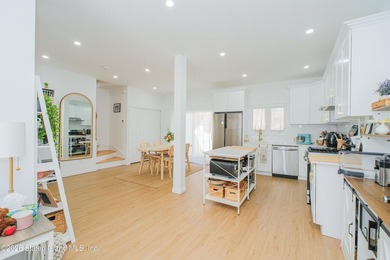 Fully gut-renovated 3 bedroom home in heart of 10309. Features a - photo 10