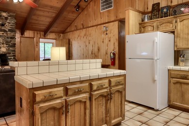 Discover the charming 3-bedroom, 2-bath cabin in Wawona - photo 12