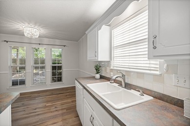 Welcome to this beautiful 4BR/3BA home tucked away on a quiet - photo 15