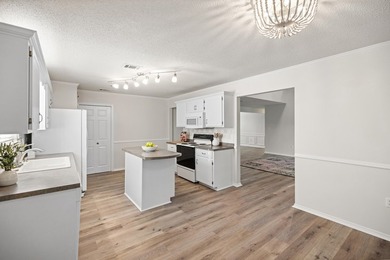 Welcome to this beautiful 4BR/3BA home tucked away on a quiet - photo 17