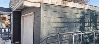 This Ranch-style property offers private rear deck, a newly