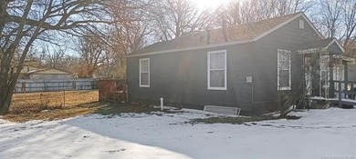 This Ranch-style property offers private rear deck, a newly