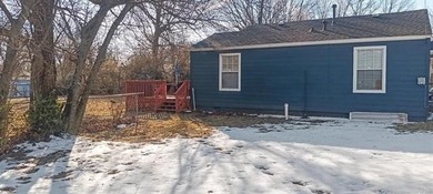 This Ranch-style property offers private rear deck, a newly