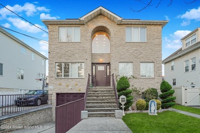 One of a kind 2-family CHC located in prestigious Dongan Hills! - photo 1
