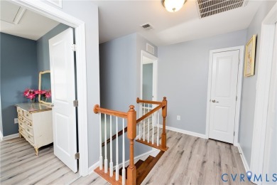 Welcome to Honey Meadows and to this well kept end-unit townhome