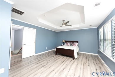 Welcome to Honey Meadows and to this well kept end-unit townhome