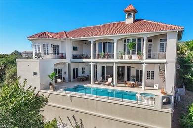 Paradise is redefined at this elevated waterfront estate, where - photo 3