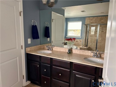 Welcome to Honey Meadows and to this well kept end-unit townhome