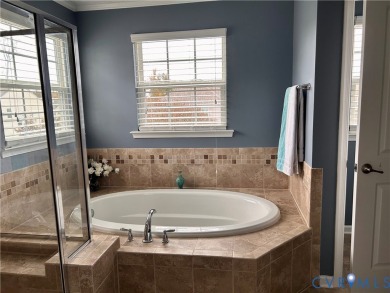 Welcome to Honey Meadows and to this well kept end-unit townhome