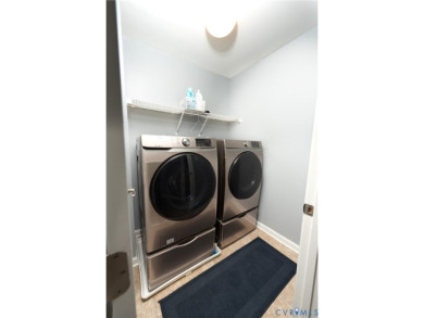 Welcome to Honey Meadows and to this well kept end-unit townhome