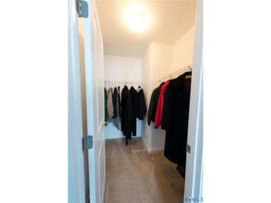 Welcome to Honey Meadows and to this well kept end-unit townhome