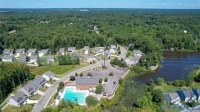 Welcome to Honey Meadows and to this well kept end-unit townhome