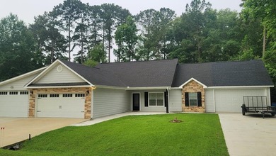 REDUCED! Make your move to Rayburn Country! This versatile home - photo 3