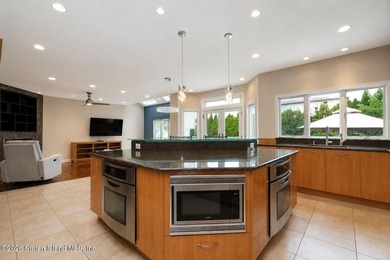 WELCOME TO THIS EXCEPTIONAL CUSTOM-BUILT 2 FAMILY COLONIAL - photo 4