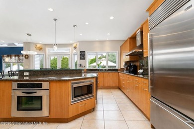 WELCOME TO THIS EXCEPTIONAL CUSTOM-BUILT 2 FAMILY COLONIAL - photo 6