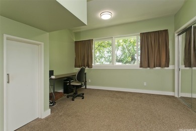 Nestled in the lush and prestigious Manoa Valley, this expansive - photo 9