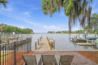 Nestled in the magical bayou-front Sacred Oaks community with - photo 5