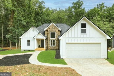 (private lake, pond, coastal) Home For Sale in Cumming Georgia