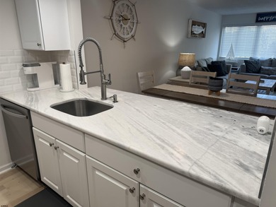 Conveniently located on the first floor, this beautifully