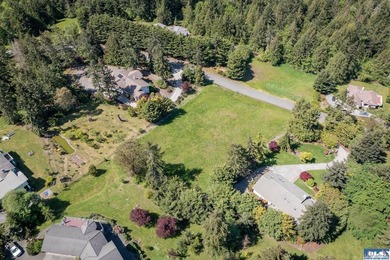 Prime one-acre lot in Sequim with stunning water views - photo 22