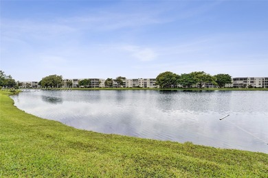 This 2 bedroom 2 bathroom 3rd floor condo on the water is - photo 2