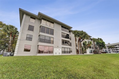 This 2 bedroom 2 bathroom 3rd floor condo on the water is - photo 3