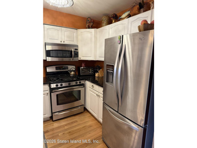 MOVE RIGHT INTO THIS BEAUTIFULLY MAINTAINED 2-BEDROOM FINISHED - photo 6