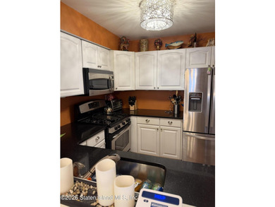 MOVE RIGHT INTO THIS BEAUTIFULLY MAINTAINED 2-BEDROOM FINISHED - photo 7