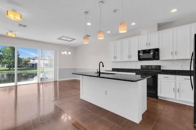 Short Sale. Welcome to a townhouse that makes everyday living - photo 2