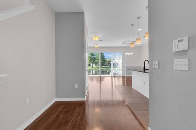 Short Sale. Welcome to a townhouse that makes everyday living - photo 3