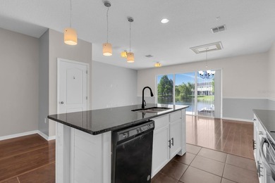 Short Sale. Welcome to a townhouse that makes everyday living - photo 5