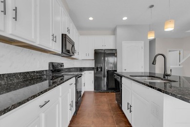 Short Sale. Welcome to a townhouse that makes everyday living - photo 6