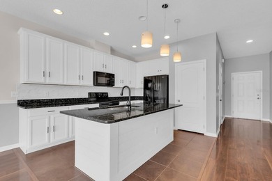 Short Sale. Welcome to a townhouse that makes everyday living - photo 7