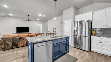 This stunning home is in pristine condition and sits on an - photo 14