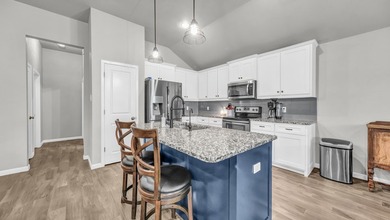 This stunning home is in pristine condition and sits on an - photo 15