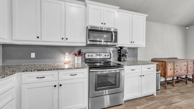 This stunning home is in pristine condition and sits on an - photo 17