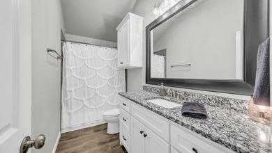 This stunning home is in pristine condition and sits on an - photo 29