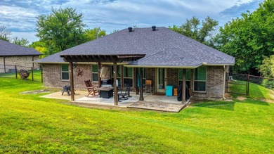 This stunning home is in pristine condition and sits on an - photo 32