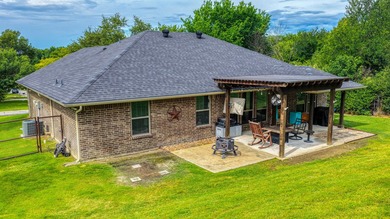 This stunning home is in pristine condition and sits on an - photo 33