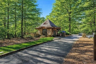 Tucked behind the private gates of The River Club-Atlanta's - photo 5