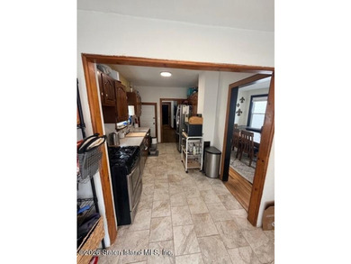 Welcome to this charming detached single-family home nestled in - photo 4