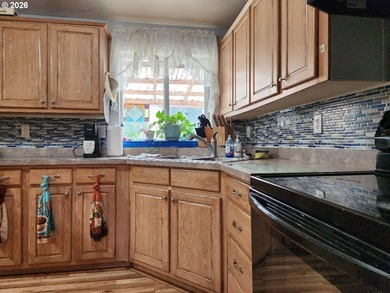 Tucked away among the trees on 1.16 private acres with a Large - photo 6