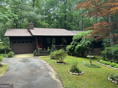 Escape to lakeside living in this beautiful home featuring its - photo 1
