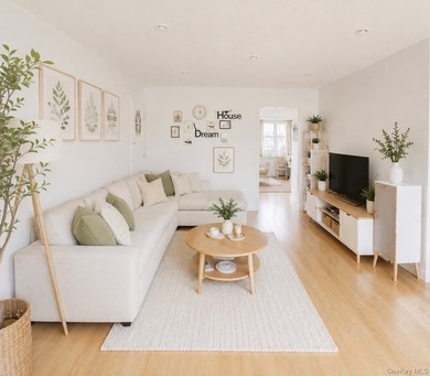 This beautifully sunlit 2-bedroom garden apartment is tucked - photo 2