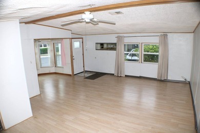 Enjoy the lake-view home on a corner lot and airy interior with - photo 9