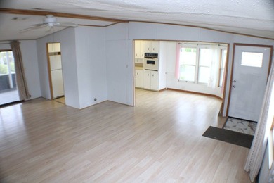 Enjoy the lake-view home on a corner lot and airy interior with - photo 10