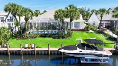 Welcome to waterfront living in the highly sought-after gated - photo 2